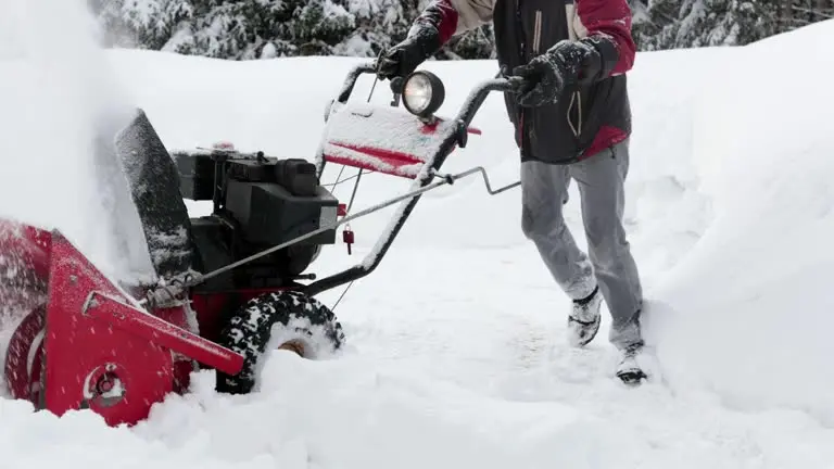 Man operating a snow plow blower machine for residential snow plowing in Green Bay WI