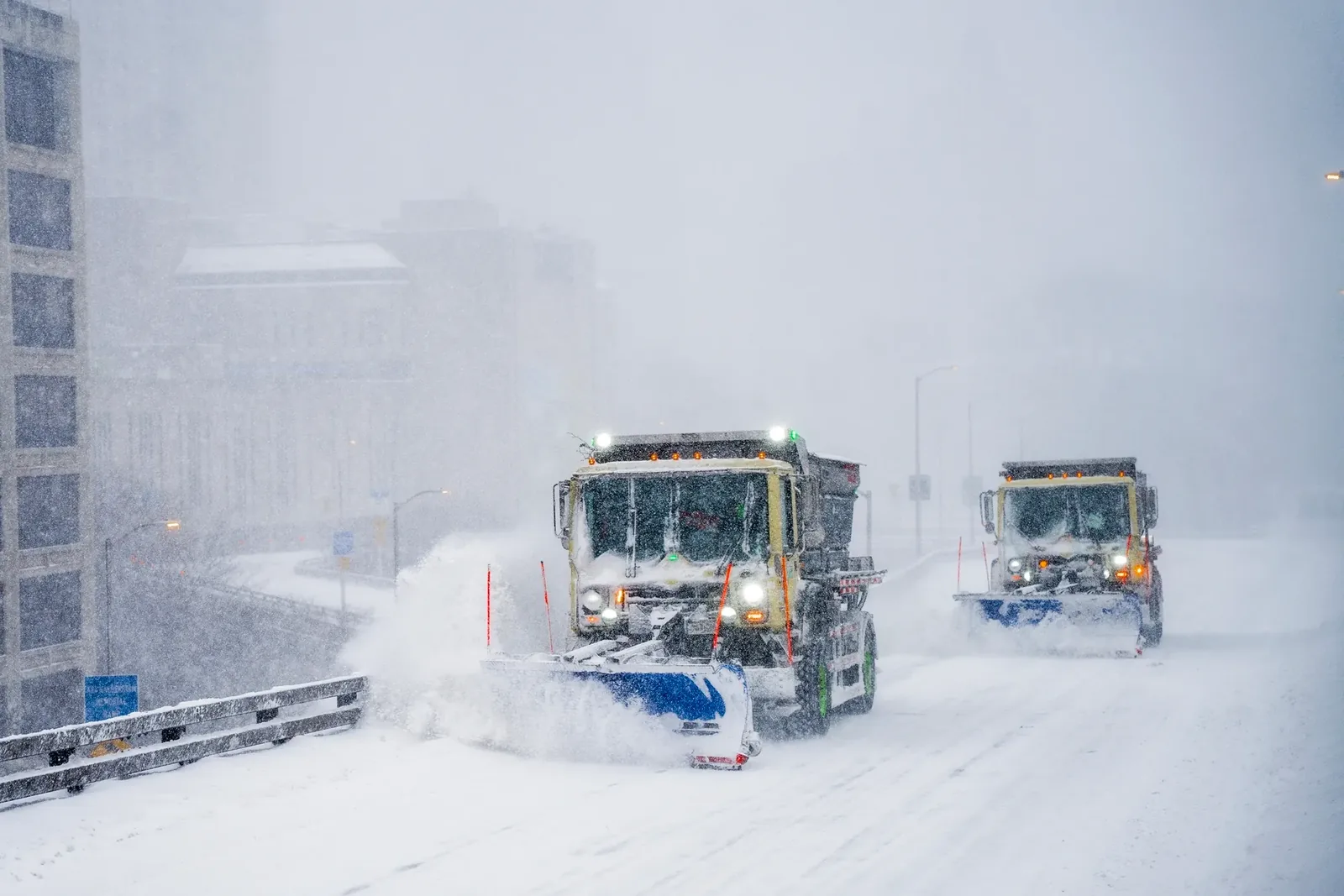 Emergency snow removal Howard, WI plowing through a heavy snowstorm