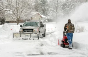 Residential snow removal Allouez, WI clearing a home driveway