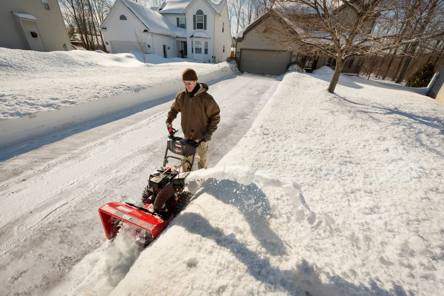 Residential snow removal De Pere, WI clearing a home driveway