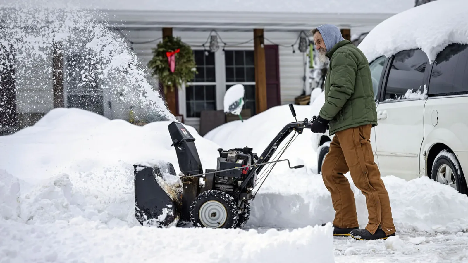 Residential snow removal Howard, WI clearing a home driveway